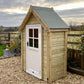 Wooden shed with a white door in a garden setting