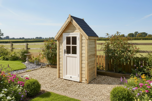 Wooden shed in a garden with flowers and a clear sky